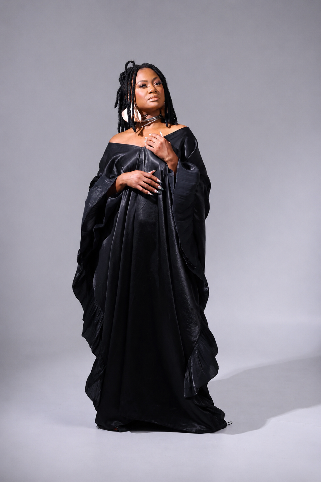 Studio portrait in a black gown